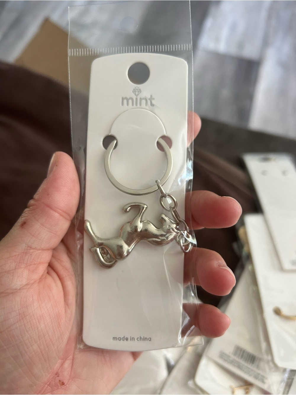 5/$25 Mint Silver Leaping Cat Keyring